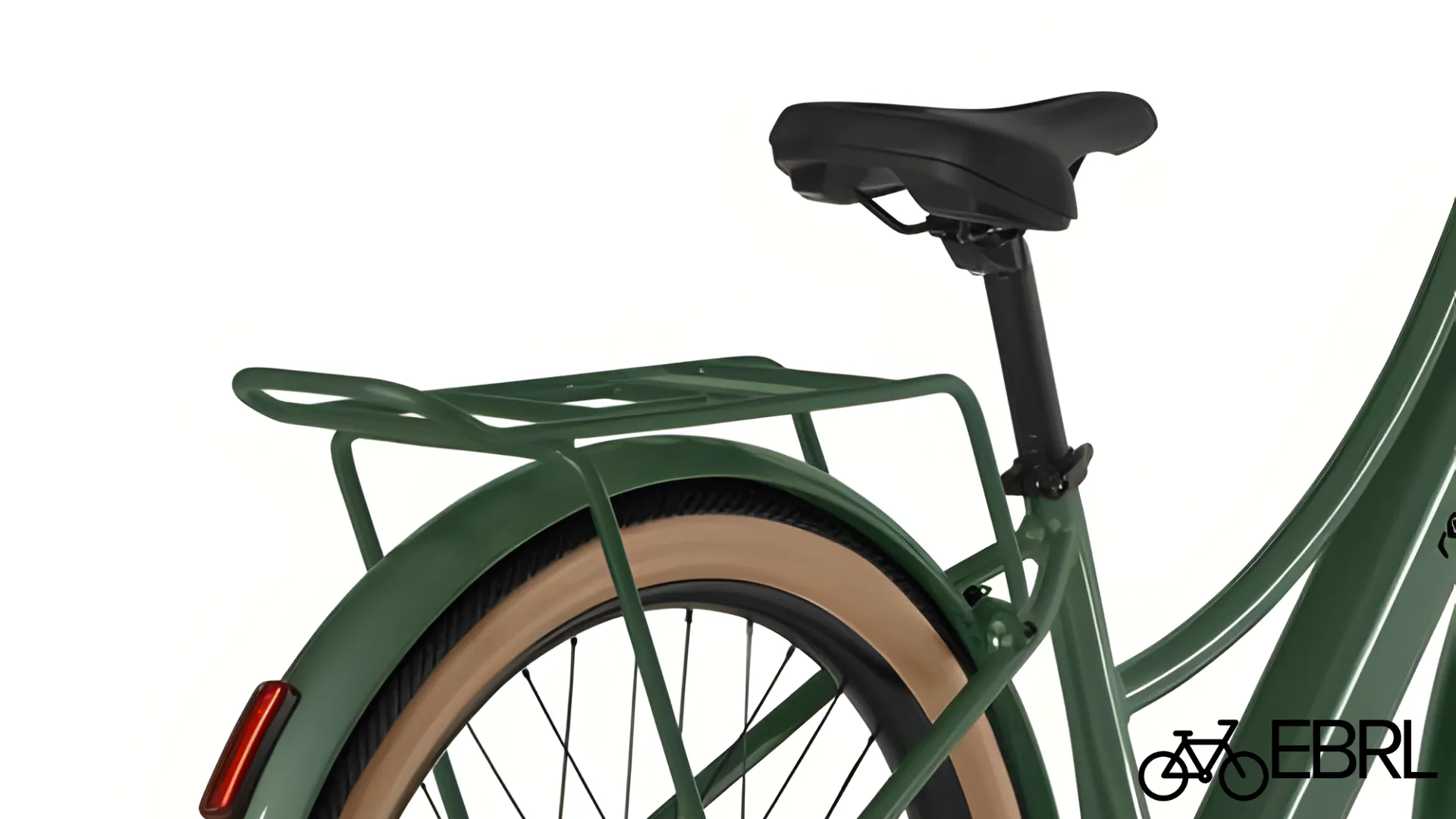 Rider on Retrospec Beaumont Rev+ Step-Through showing upright Dutch handlebar riding position