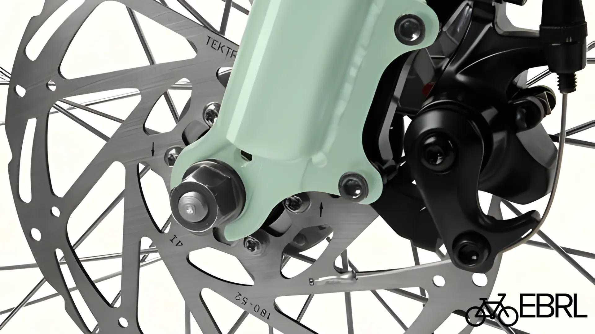 Tektro mechanical disc brake with 180mm rotor on the Retrospec Chatham Rev+ 2 electric beach cruiser