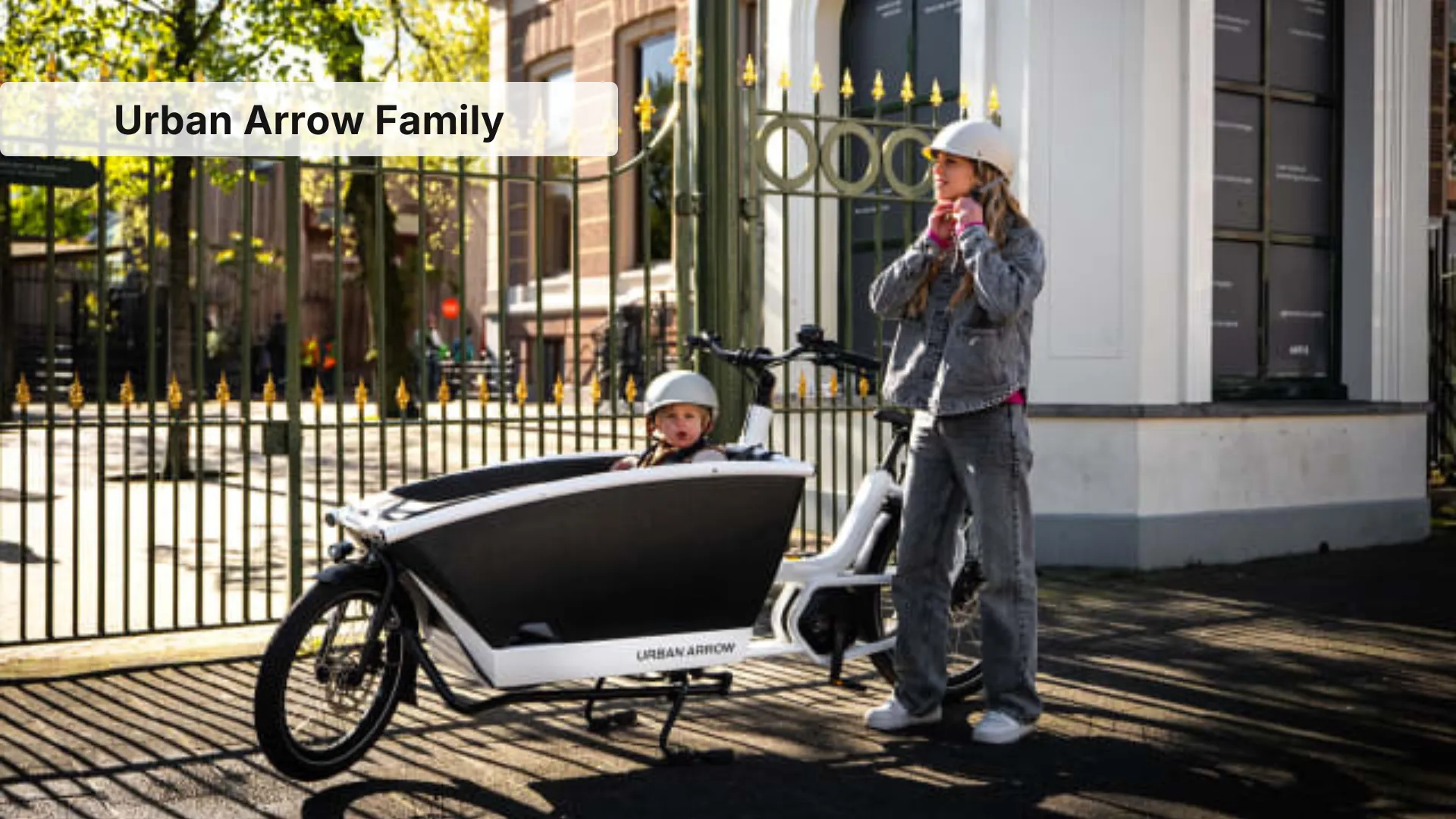 Urban Arrow Family electric cargo bike with EPP foam box and two children in front cargo area
