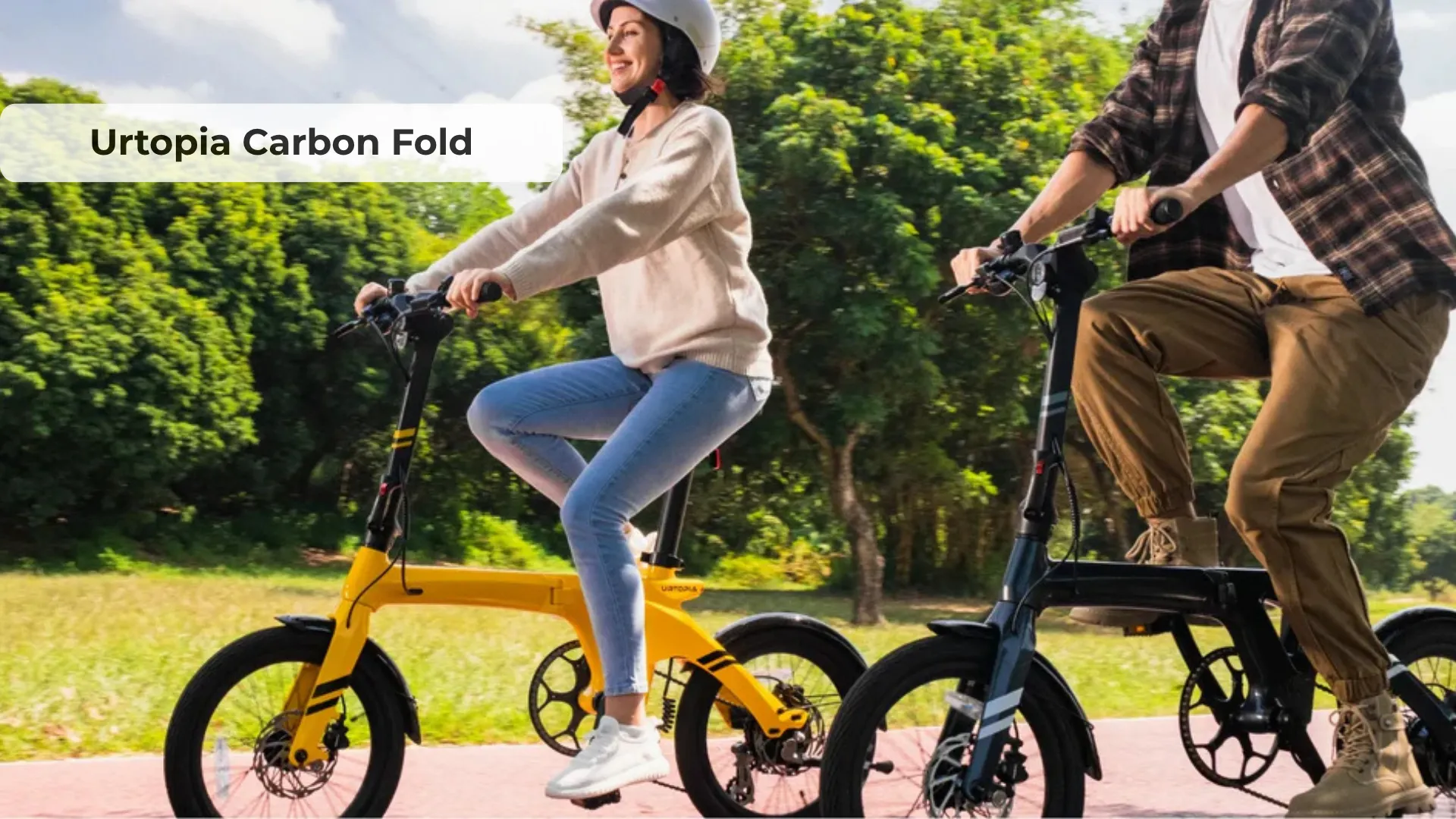 Urtopia Carbon Fold electric bike in saffron yellow, full carbon fiber frame shown folded and compact