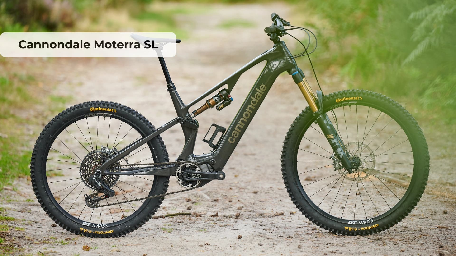 Cannondale Moterra SL electric mountain bike on rocky trail showing lightweight carbon frame and mixed wheel setup
