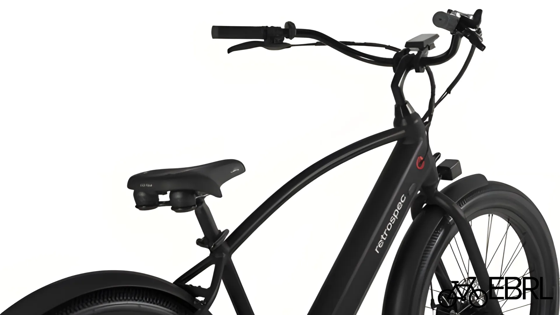 Riding the Chatham Rev+ 2 beach cruiser e-bike on a paved coastal path