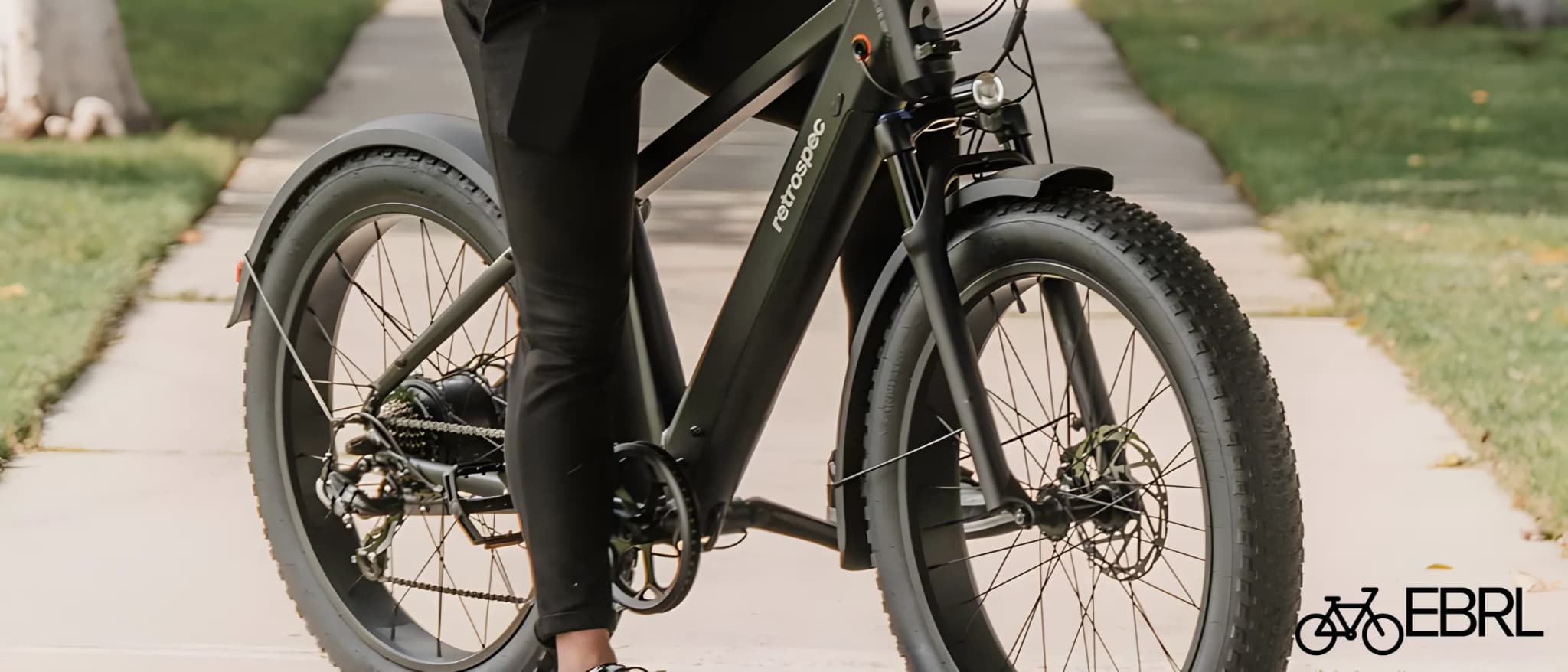 Retrospec Koa Rev 3 fat tire electric bike on a gravel trail