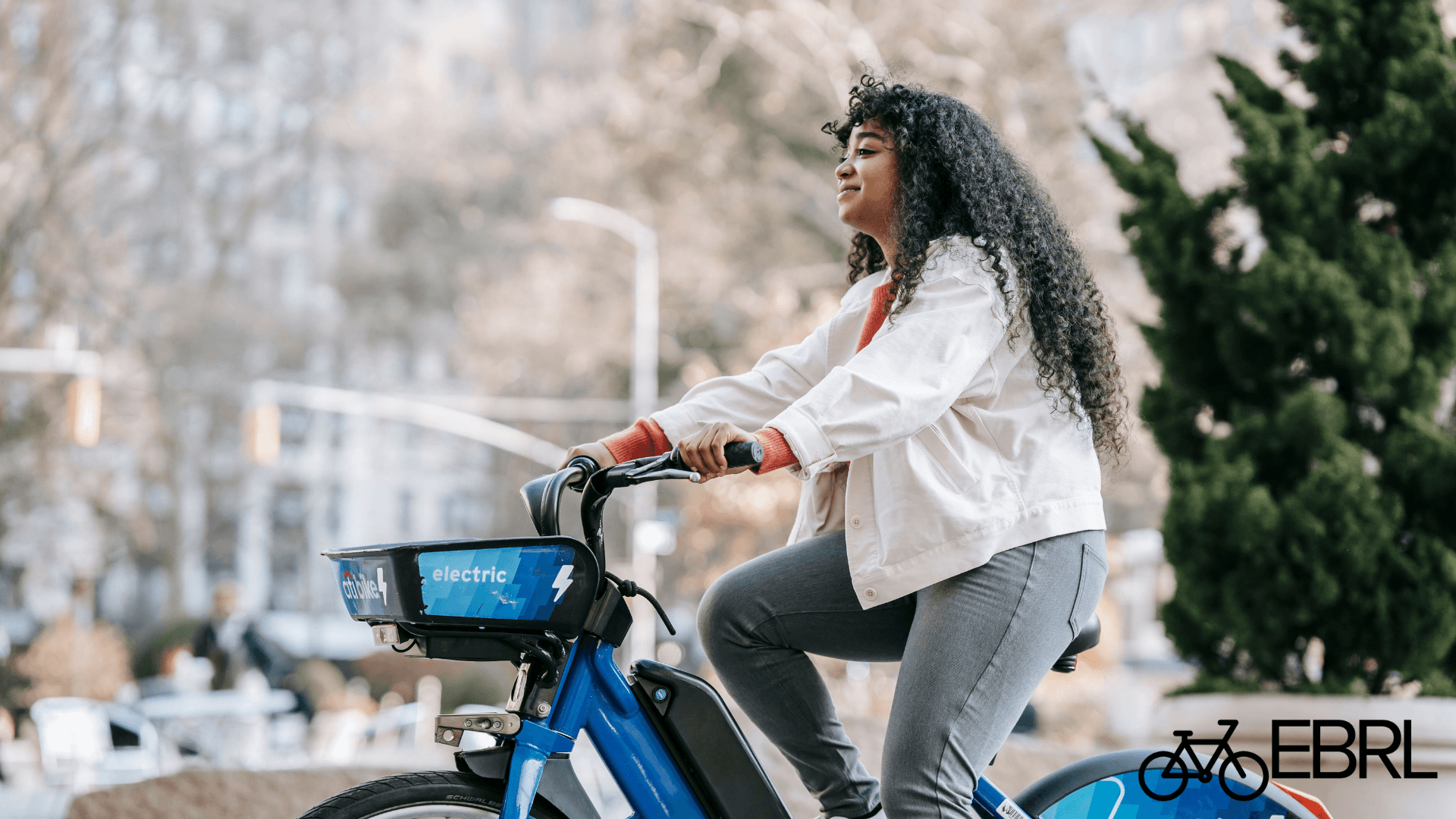 Rider on a step-through electric bike suited for seniors and riders with mobility limitations