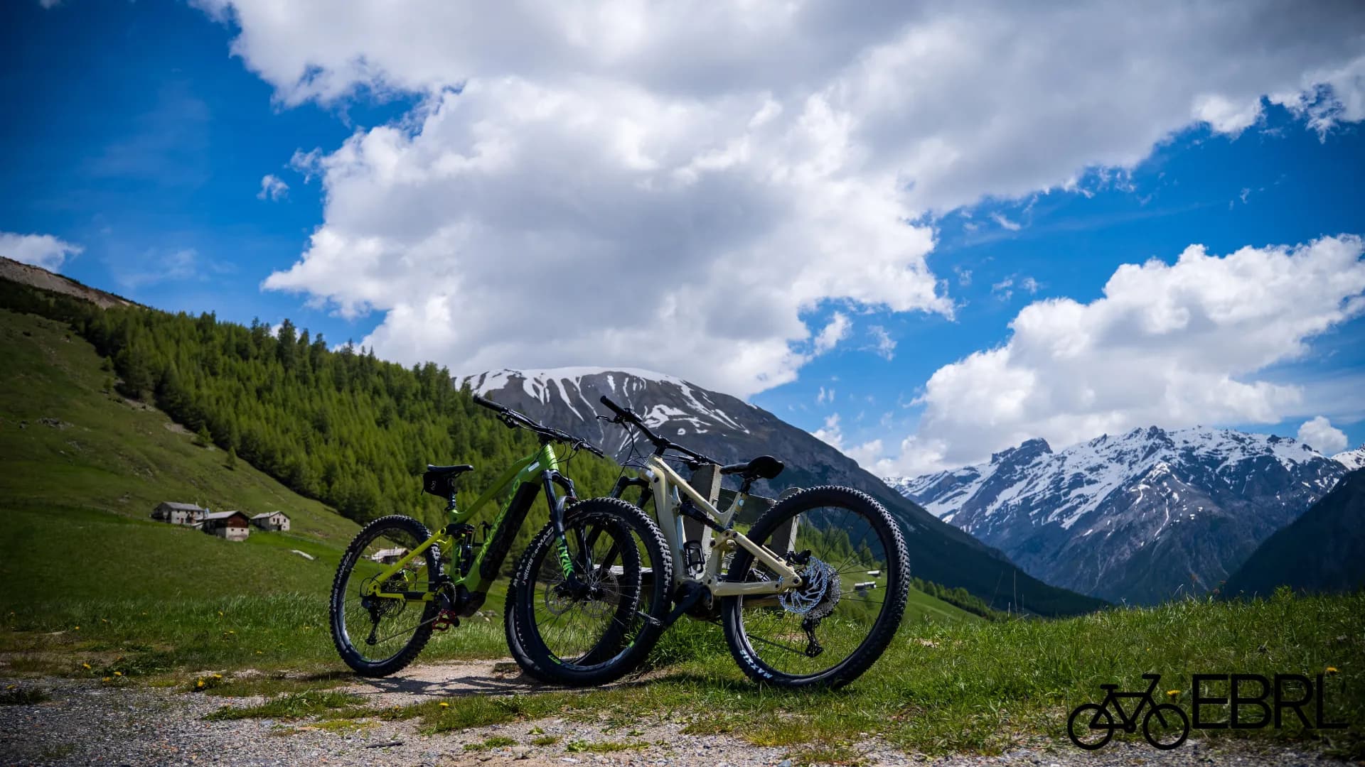 Mountain bikers on a trail deciding between electric and regular bikes